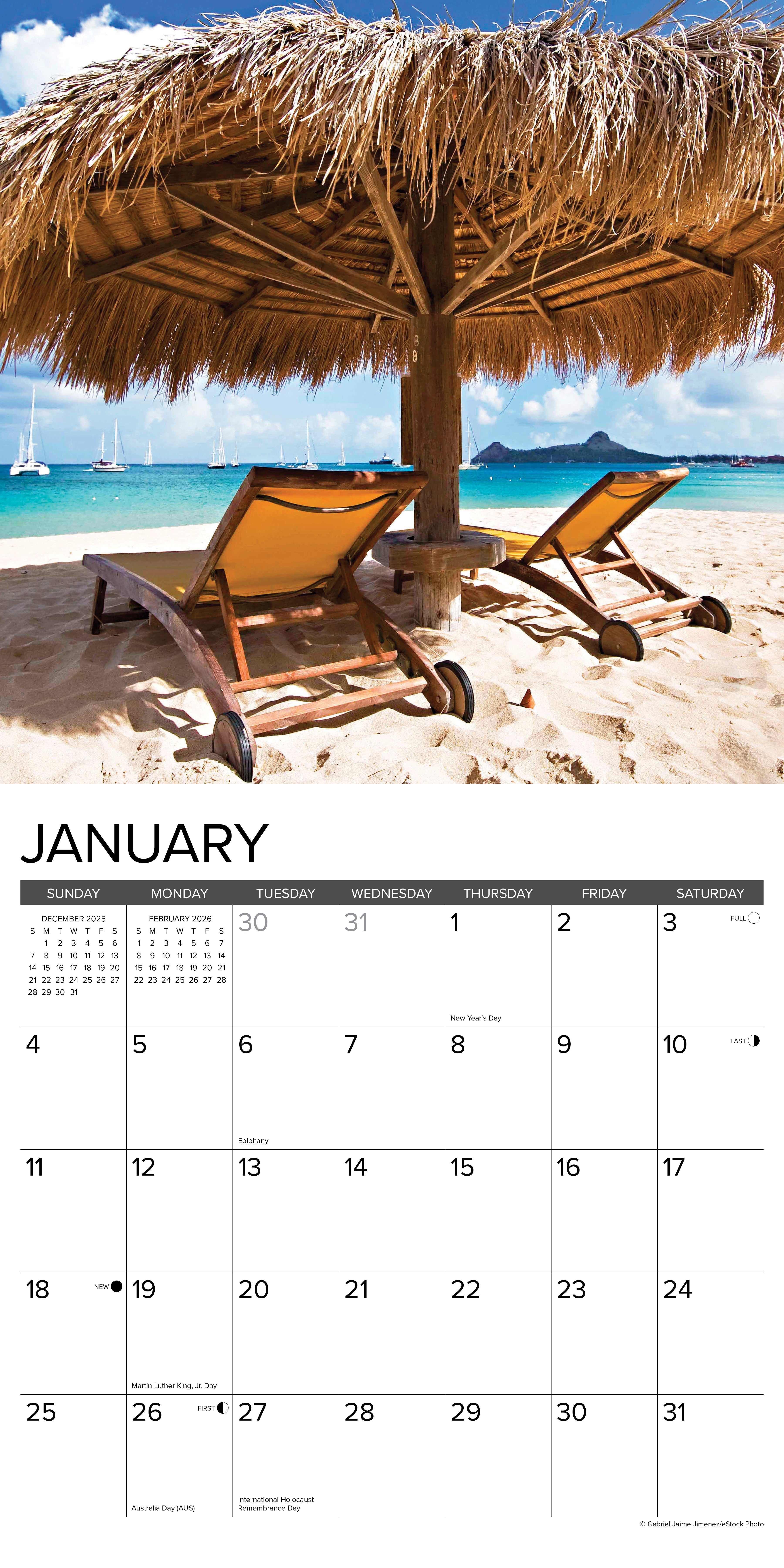 2026 beach wall calendar image for January featuring beach chairs under a thatched umbrella by the ocean.