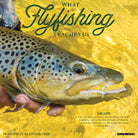 What Fly Fishing Teaches Us 2026 Wall Calendar cover featuring a hand holding a brown trout against a shimmering water background.
