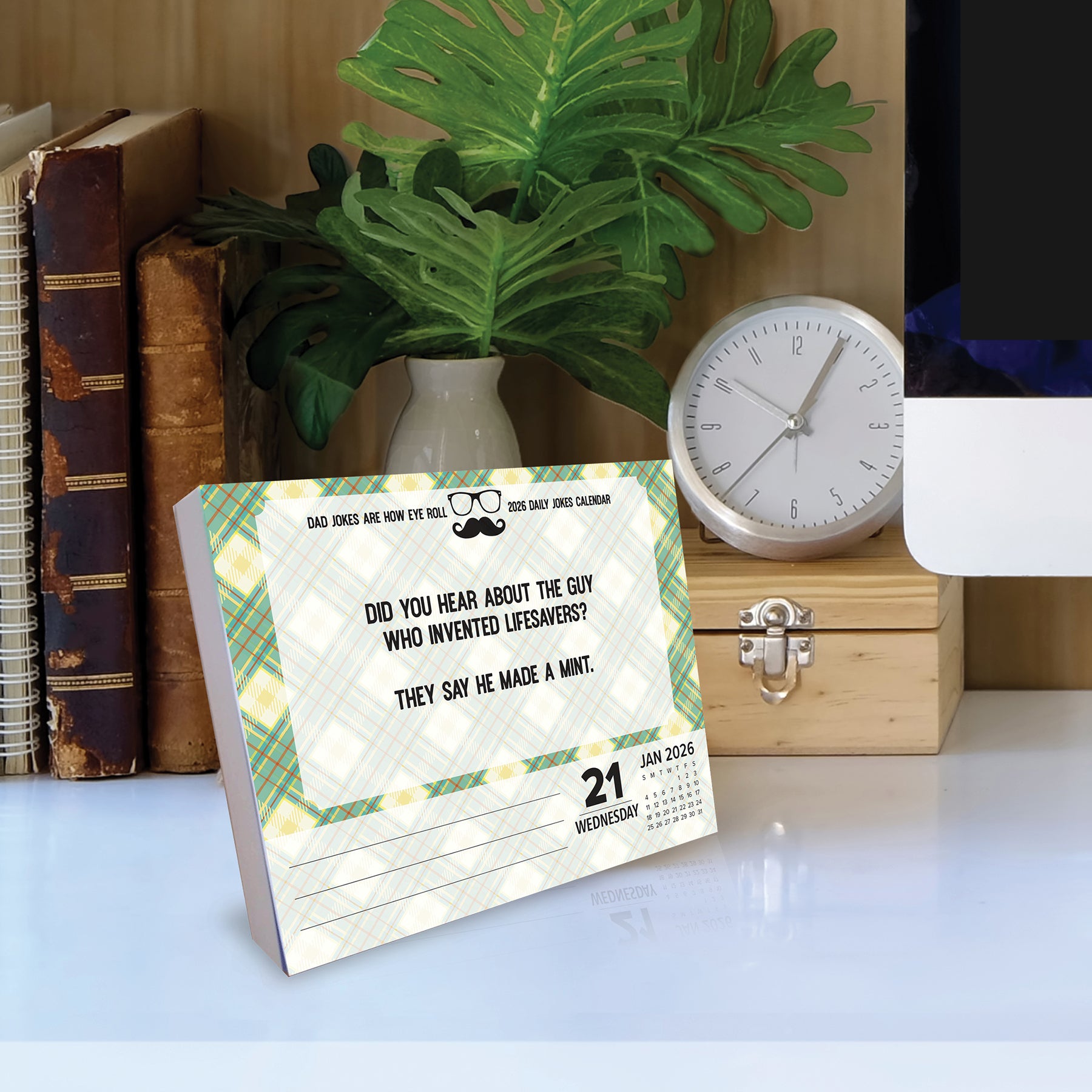 2026 Dad Jokes Daily Box Calendar open to January 21st, featuring a joke about lifesavers and a mint.