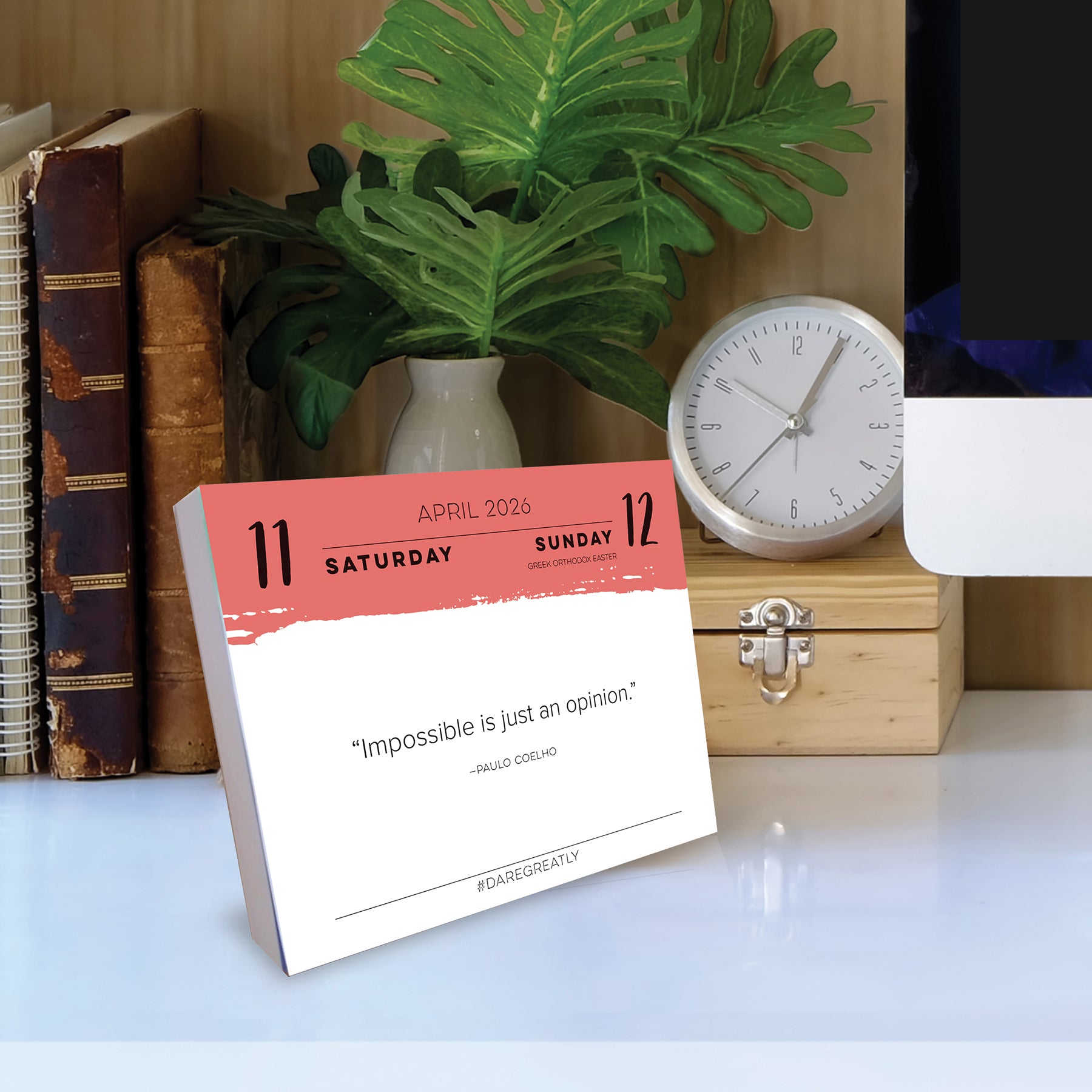 2026 Daily Box Calendar with inspirational quote on desk, perfect for daily motivation and organization.