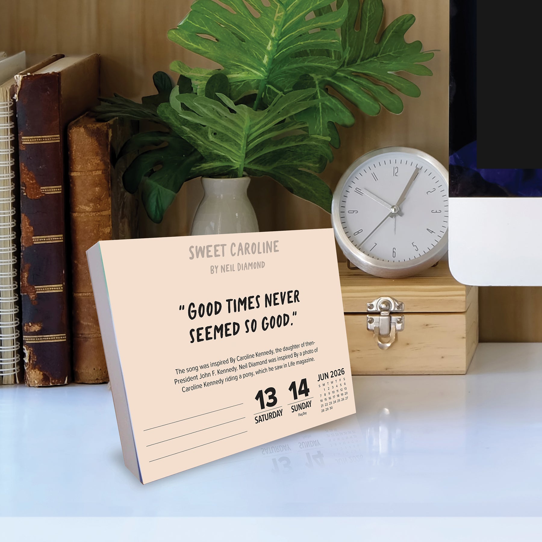 2026 Daily Box Calendar featuring lyrics from Sweet Caroline by Neil Diamond, adding daily inspiration and music history.